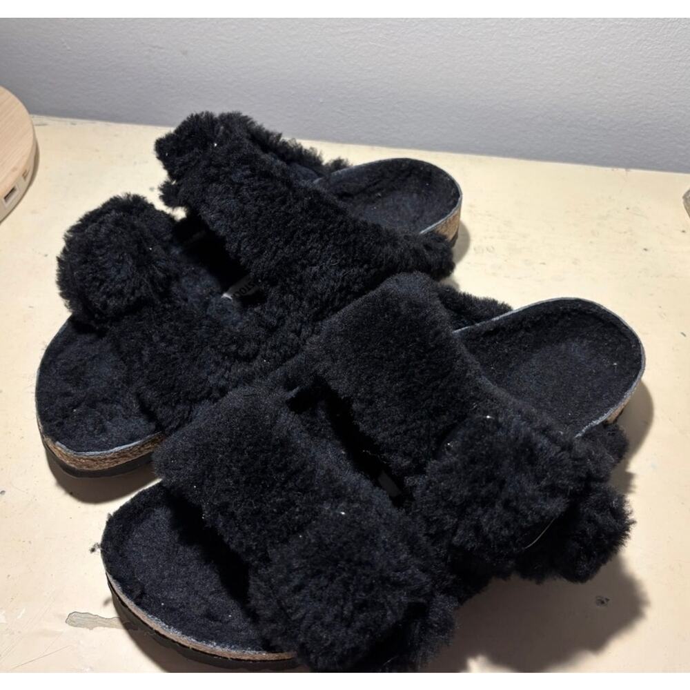 Birkenstock black shearling Sandals.